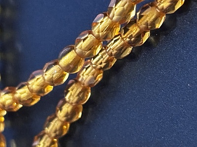 16" Strand of 3mm Amber-colored Beads